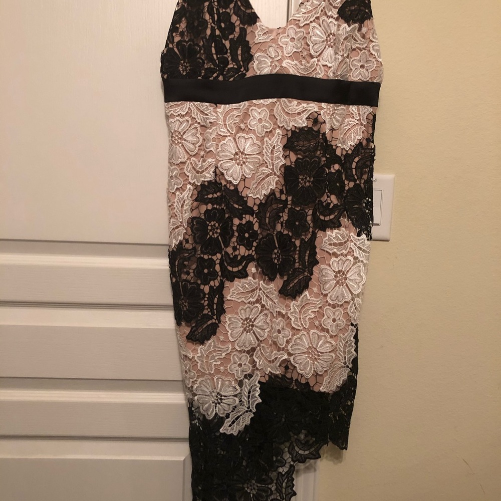 Bardot cocktail dress with spaghetti straps.